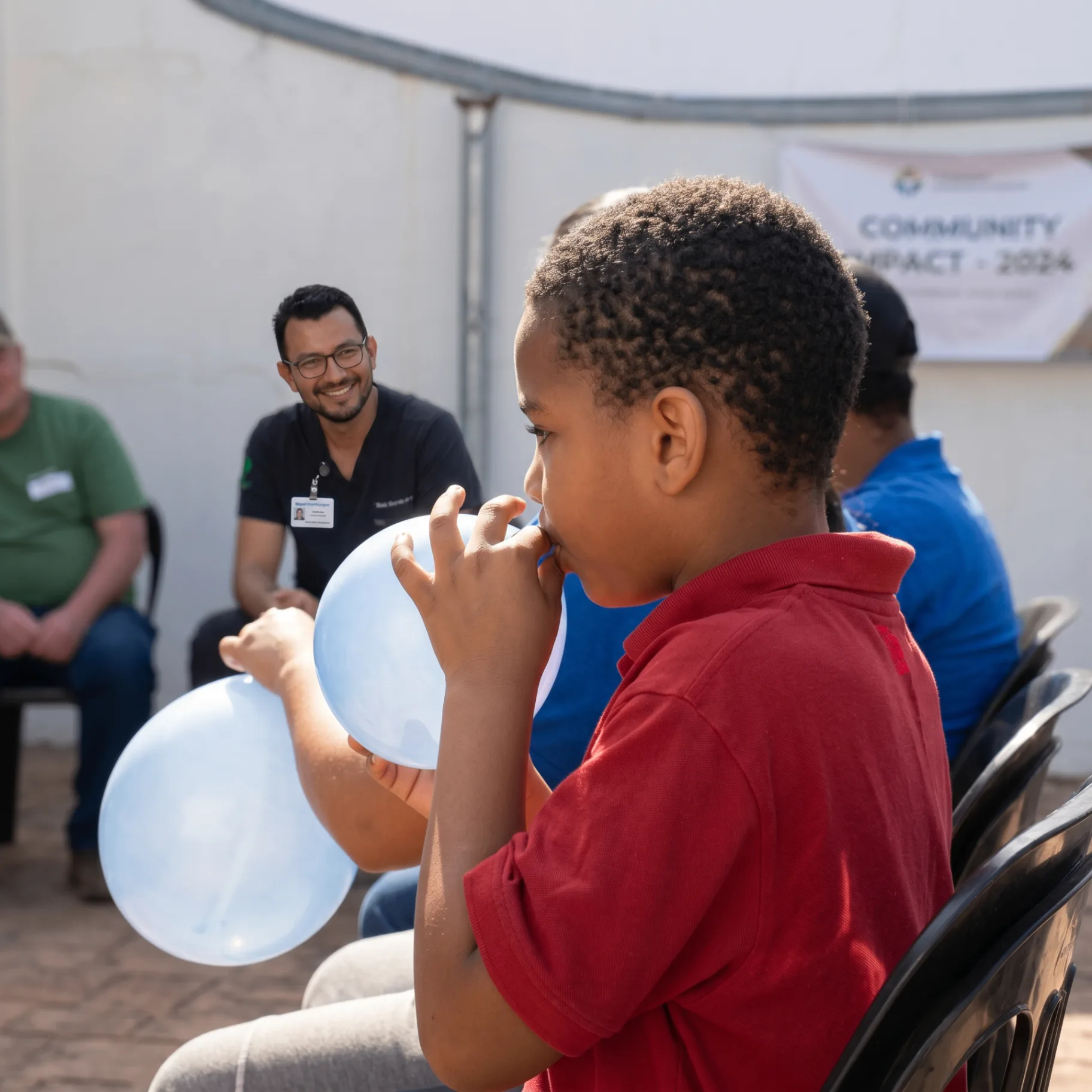 Criança em evento comunitário do Acha Motorista